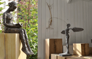 Sculptures on oak plinths